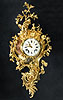 An extremely beautiful Louis XV gilt bronze grand cartel clock of eight day duration, signed on the white enamel dial Bellin à Paris